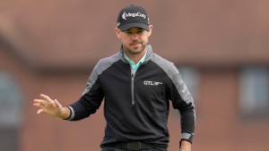 Harman matches The Open records at Hoylake to build a big lead