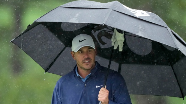 Koepka leads rainy 87th Masters as third-round suspended for day