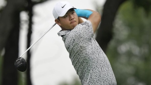 Kim shoots 68, makes Open cut on severely sprained ankle